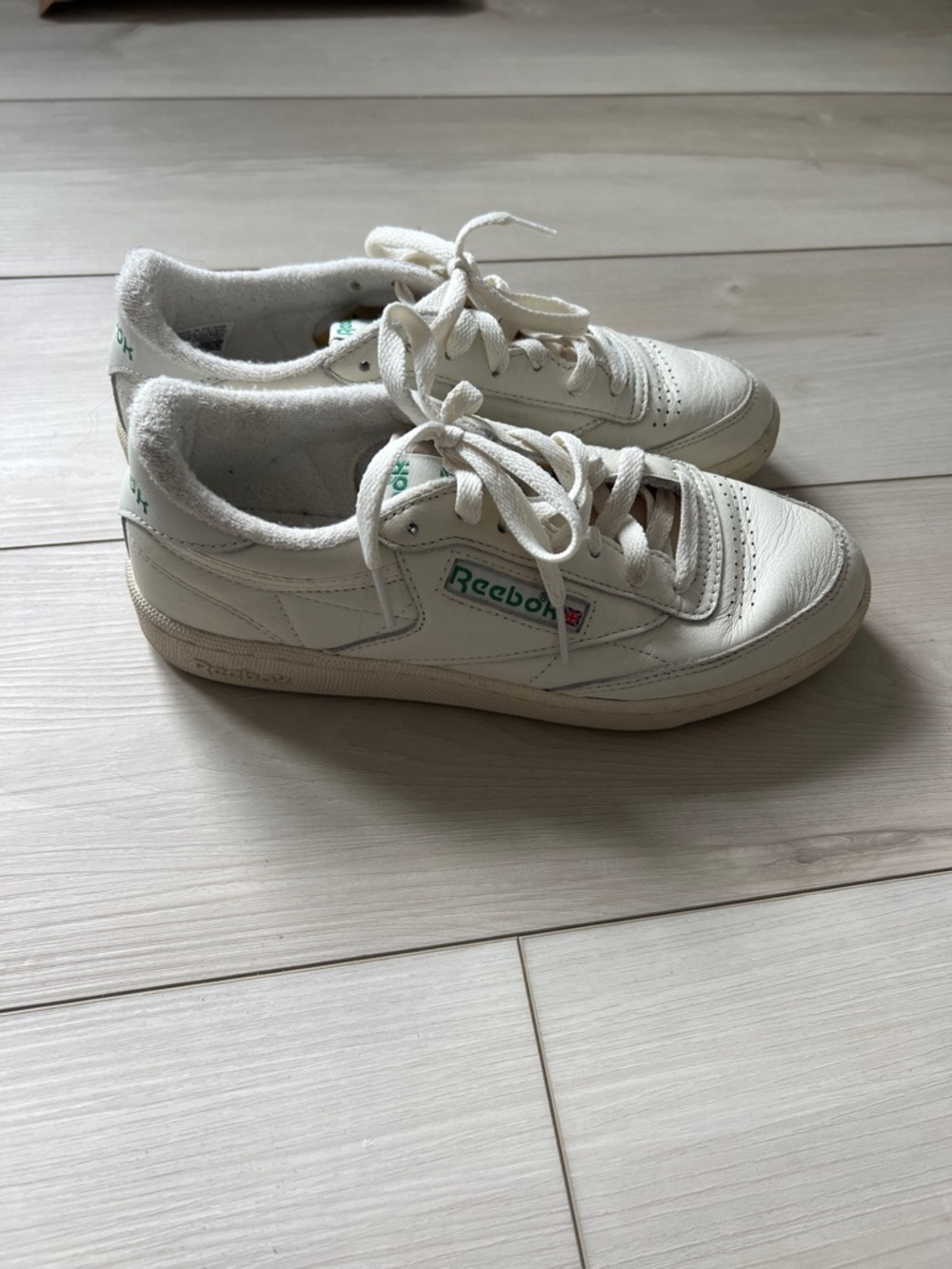 Reebok White Sneakers with Green Logo Accents